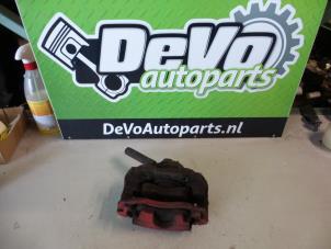 Used Front brake calliper, left Peugeot 307 (3A/C/D) 1.4 16V Price on request offered by DeVo Autoparts