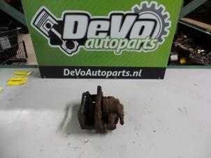 Used Front brake calliper, right Opel Corsa D 1.2 16V Price on request offered by DeVo Autoparts