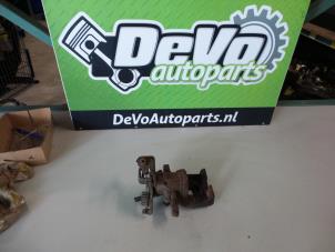 Used Rear brake calliper, right Ford Mondeo III 2.0 TDCi 115 16V Euro IV Price on request offered by DeVo Autoparts