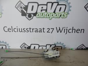 Used Front door lock mechanism 4-door, right Toyota Yaris III (P13) 1.5 16V Hybrid Price on request offered by DeVo Autoparts