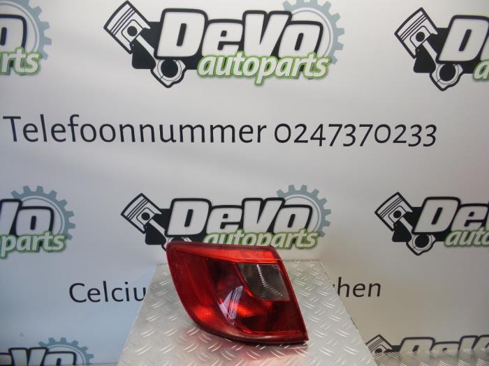 Taillight, left from a Seat Ibiza ST (6J8) 1.4 16V 2013