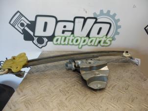 Used Door window motor Renault Clio IV (5R) 0.9 Energy TCE 90 12V Price on request offered by DeVo Autoparts