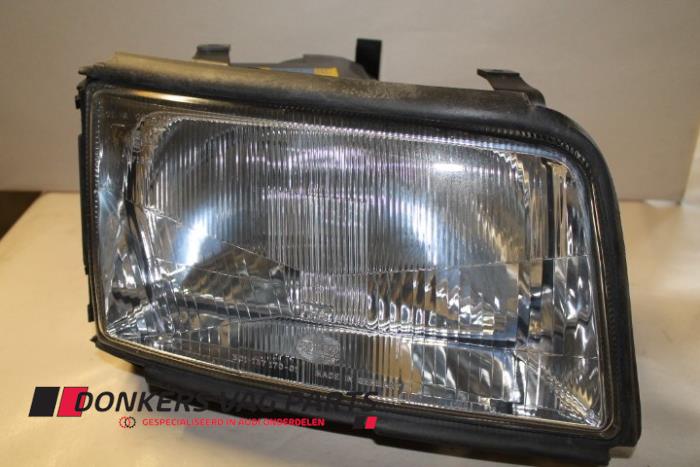 Nowe Reflektor prawy Audi 100 Cena € 35,01 Z VAT oferowane przez Donkers VAG Parts