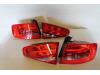 Set of taillights, left + right from a Audi A4 2013