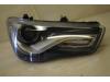Headlight, right from a Audi A1 2011