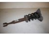 Fronts shock absorber, left from a Audi A4 2006