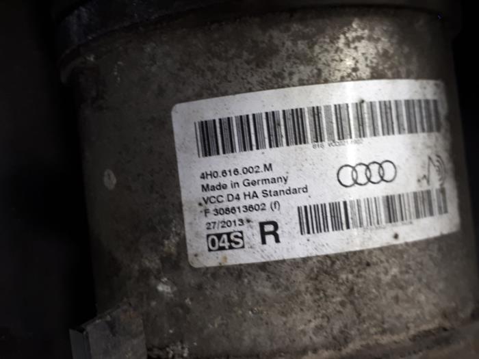 Rear shock absorber, right from a Audi A8 (D4) 4.0 V8 32V TFSI Quattro 2013