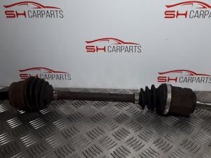 Used Front drive shaft, left Opel Corsa D 1.2 16V Price € 14,00 Margin scheme offered by SH Carparts