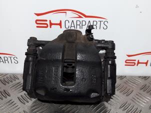 Used Front brake calliper, left Mini Mini (R56) 1.6 Cooper D 16V Price € 16,00 Margin scheme offered by SH Carparts