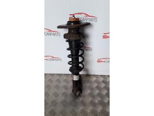 Used Rear shock absorber rod, right Mini Mini (R56) 1.6 Cooper D 16V Price € 56,00 Margin scheme offered by SH Carparts