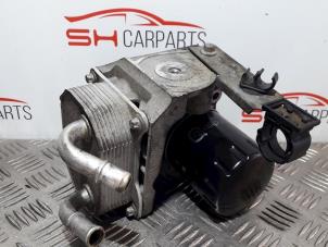 Used Oil filter housing Ford Mondeo IV 1.8 TDCi 125 16V Price € 42,00 Margin scheme offered by SH Carparts