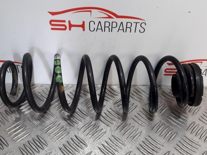 Rear coil spring from a Seat Ibiza III (6L1) 1.4 16V 85 2007