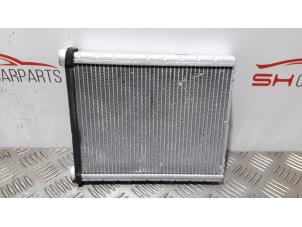 Usados Radiador de calefactor Mercedes CLA (117.3) 1.6 CLA-180 16V Precio de solicitud ofrecido por SH Carparts