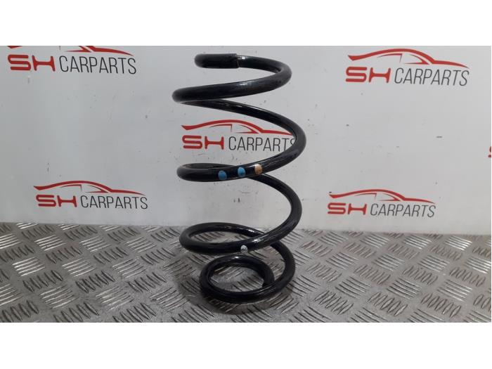 Rear coil spring from a Mercedes-Benz CLA (118.3) 1.3 CLA-180 Turbo 16V 2019