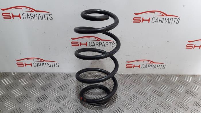 Rear coil spring from a Mercedes-Benz CLA (117.3) 1.6 CLA-180 16V 2013
