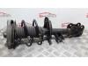 Front shock absorber rod, left from a Mercedes-Benz A (W176) 1.8 A-200 CDI 16V 2013