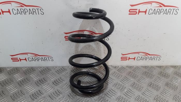 Rear coil spring from a Mercedes-Benz CLA (118.3) 1.3 CLA-180 Turbo 16V 2021