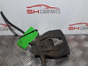 Used Front brake calliper, left Opel Corsa C (F08/68) 1.2 16V Twin Port Price € 16,00 Margin scheme offered by SH Carparts