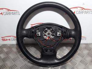 Used Steering wheel Opel Corsa C (F08/68) 1.2 16V Twin Port Price € 20,00 Margin scheme offered by SH Carparts