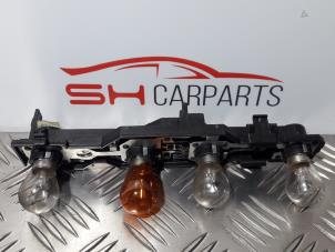 Used PCB, left taillight Opel Combo (Corsa C) 1.3 CDTI 16V Price € 8,00 Margin scheme offered by SH Carparts