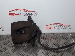 Used Front brake calliper, left Opel Corsa D 1.2 16V Price € 16,00 Margin scheme offered by SH Carparts