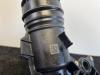Oil filter housing from a BMW X6 (G06) xDrive M50d 3.0 24V