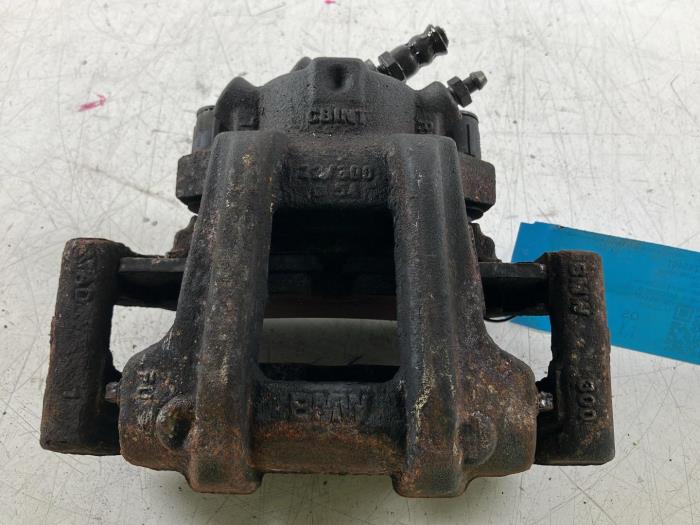 Brake caliper carrier