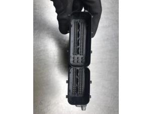 Engine management computer from a Volkswagen Multivan T5 (7E/7HC/7HF/7HM) 2.5 TDi 2005