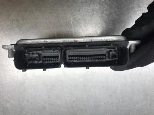 Engine management computer from a Seat Alhambra (7V8/9) 2.0 2006