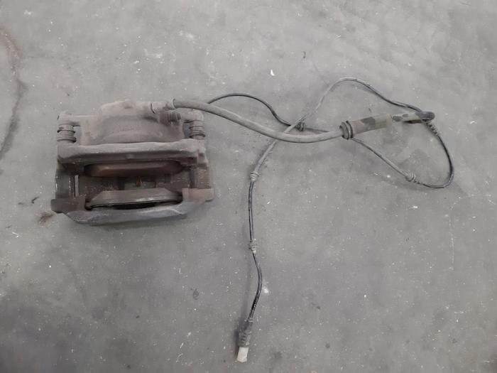 Front brake calliperholder, right from a Mercedes-Benz A (W176) 1.6 A-180 16V 2015