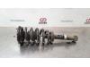 Fronts shock absorber, left from a Mitsubishi L-200 2.4 Clean Diesel 4WD 2018