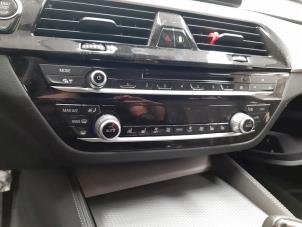 Used Air conditioning control panel BMW 5 serie Touring (G31) 523d 2.0 TwinPower Turbo 16V Price € 447,70 Inclusive VAT offered by Autohandel Didier