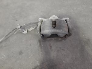 Used Front brake calliperholder, right Volkswagen Golf VII (AUA) 1.6 TDI BlueMotion 16V Price € 66,55 Inclusive VAT offered by Autohandel Didier