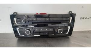 Used Air conditioning control panel BMW 1 serie (F20) 116d 1.5 12V TwinPower Price € 163,35 Inclusive VAT offered by Autohandel Didier