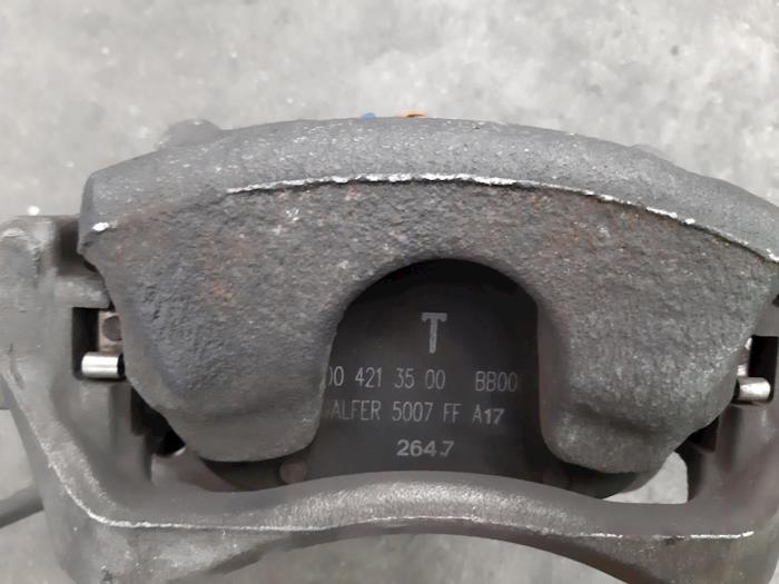 Front brake calliperholder, right from a Mercedes-Benz A (W176) 1.6 A-180 16V 2018