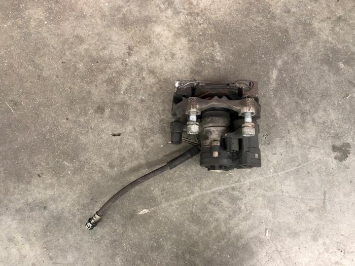 Rear brake calliperholder, left from a Audi A3 Sportback (8VA/8VF) 1.0 30 TFSI 12V 2019