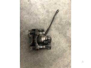 Used Rear brake calliperholder, right Audi A3 Sportback (8VA/8VF) 1.0 30 TFSI 12V Price on request offered by Autohandel Didier