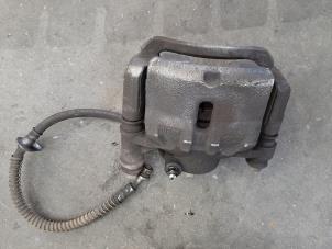 Used Front brake calliperholder, left Kia Picanto (TA) 1.0 12V Price € 66,55 Inclusive VAT offered by Autohandel Didier