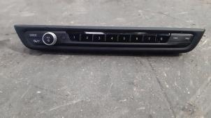 Used Radio remote control BMW 1 serie (F40) 116d 1.5 12V TwinPower Price € 36,30 Inclusive VAT offered by Autohandel Didier