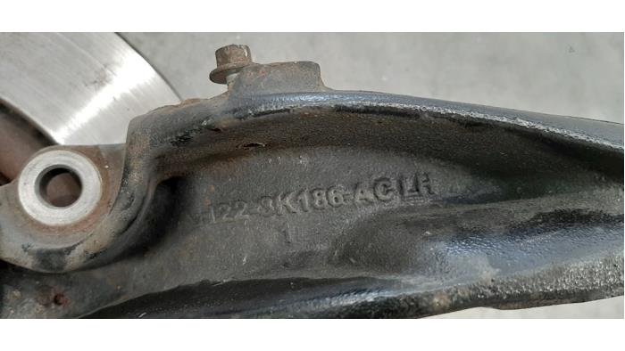 Knuckle, front left from a Land Rover Discovery IV (LAS) 3.0 SD V6 24V 2016