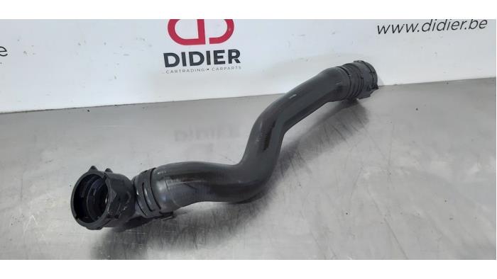 Radiator hose from a Audi A6 Avant (C8) 2.0 40 TDI Mild Hybrid 2018
