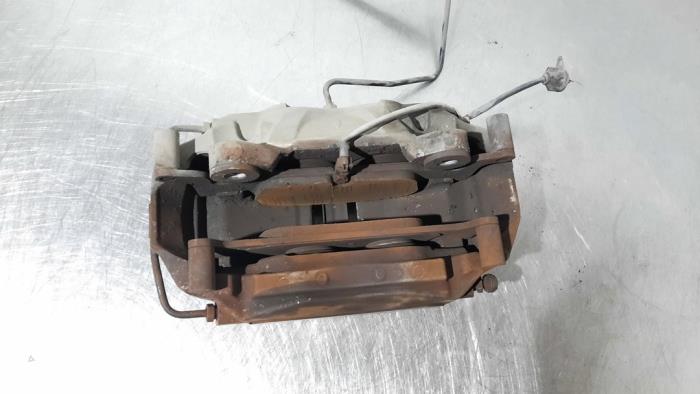 Front brake calliper, left from a Audi Q5 (FYB/FYG) 2.0 TDI 16V 2017