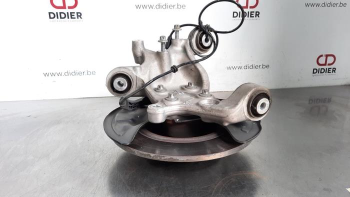 Knuckle, rear left from a Mercedes-Benz A (W176) 1.5 A-180 CDI, A-180d 16V 2018