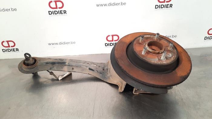 Knuckle, rear right from a Volvo V40 (MV) 1.6 D2 2015