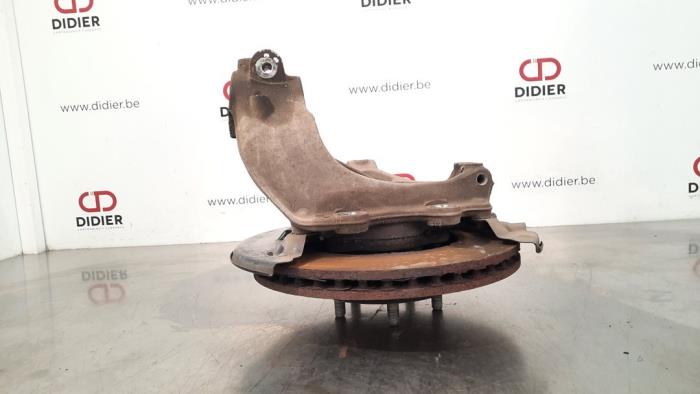 Knuckle, front right from a Volvo V40 (MV) 1.6 D2 2015