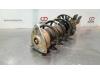 Fronts shock absorber, left from a Opel Combo Cargo 1.2 110 2021