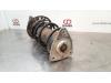Fronts shock absorber, left from a Opel Combo Life/Tour 1.2 110 2020