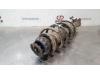 Fronts shock absorber, left from a Kia Picanto (JA) 1.0 12V 2021