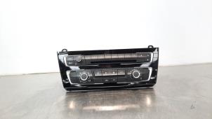 Gebrauchte Radio BMW 1 serie (F20) 116d 1.5 12V TwinPower Preis € 447,70 Mit Mehrwertsteuer angeboten von Autohandel Didier
