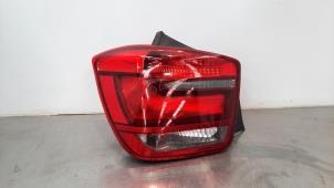Used Taillight, left BMW 1 serie (F20) 114i 1.6 16V Price € 48,40 Inclusive VAT offered by Autohandel Didier